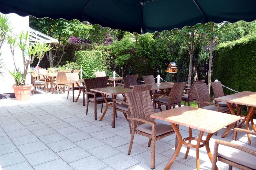 Hotel Am Ostpark Нойбиберг Екстериор снимка