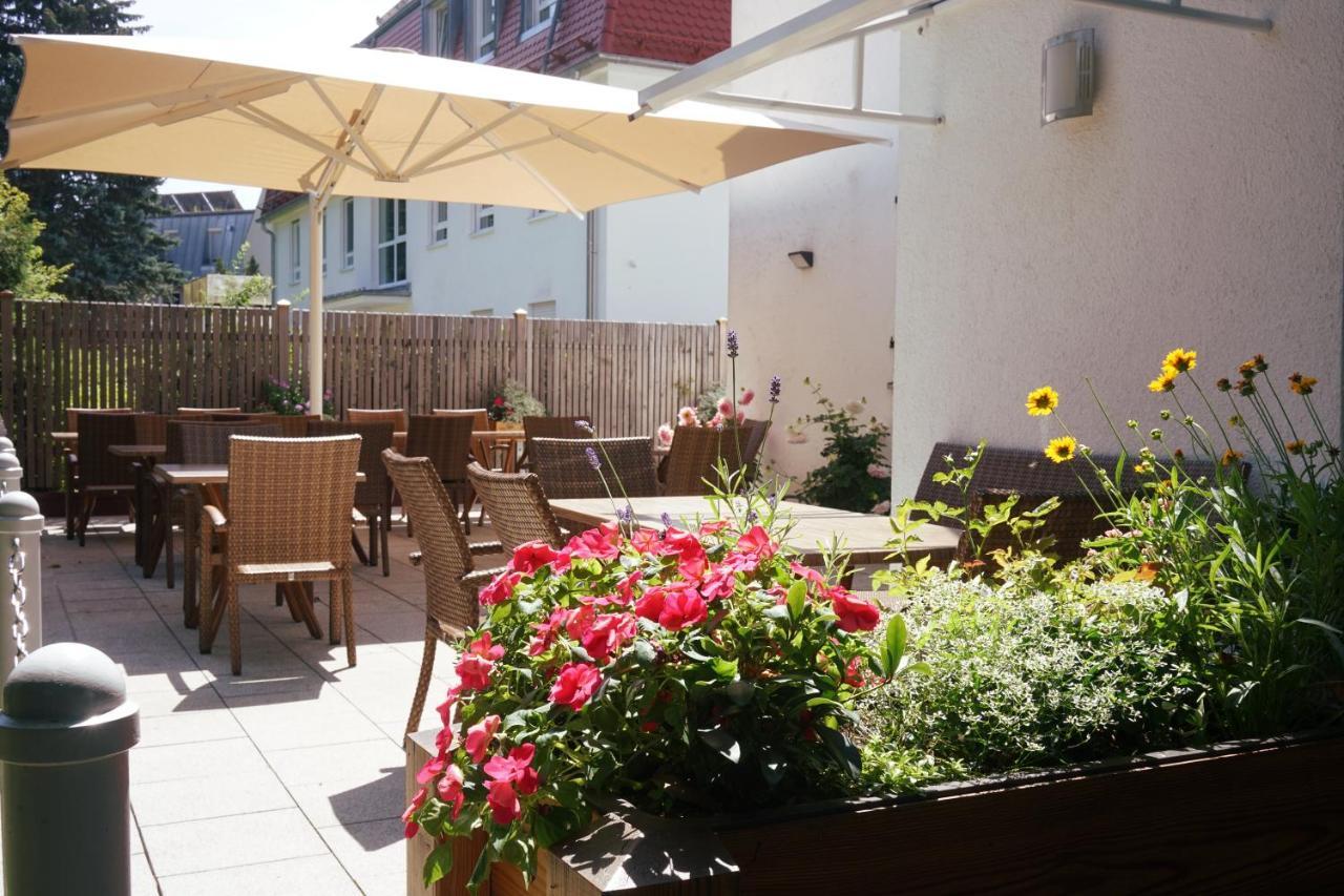 Hotel Am Ostpark Нойбиберг Екстериор снимка